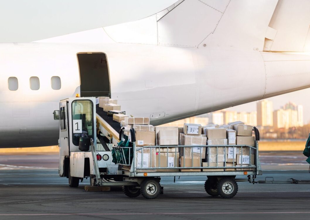 Close-up,Detail,View,Of,Cargo,Cart,Trolley,Full,With,Commercial